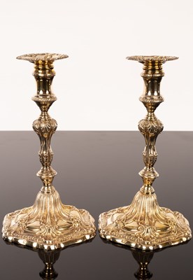 Lot 374 - A pair of silver gilt taper sticks, TSC,...