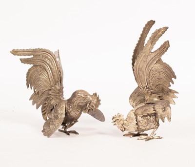 Lot 383 - A pair of plated fighting cock table ornaments,...