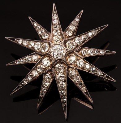 Lot 417 - A Victorian diamond starburst brooch/pendant...