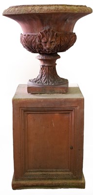 Lot 506 - A terracotta campana-shaped vase on a pedestal...