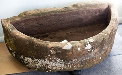 Lot 507 - A large D-shaped stone trough, 117cm x 57cm