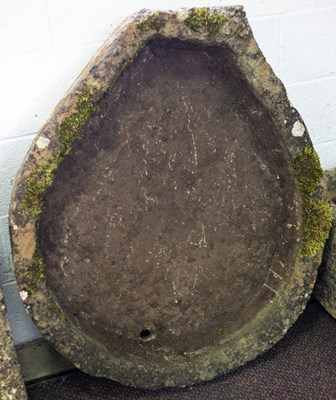 Lot 521 - A pear-shaped stone trough, 104cm x 87cm