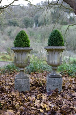 Lot 525 - A pair of campana urns with Bacchic mask...