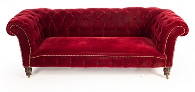 Lot 554 - A Chesterfield sofa, the button back and arms...