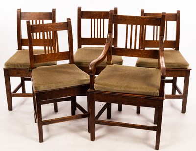 Lot 557 - Four oak single chairs with solid seats, on...