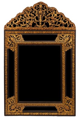 Lot 573 - A Venetian wall mirror, the arch-top applied...