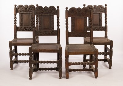 Lot 591 - A set of four 17th Century oak hall chairs,...