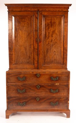 Lot 596 - A George III mahogany linen press, the upper...