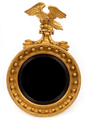 Lot 602 - A Regency convex mirror, the ball studded...