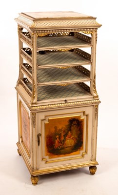 Lot 603 - A painted music cabinet, the onyx top above...