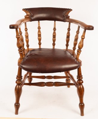 Lot 611 - A 19th Century beechwood elbow chair