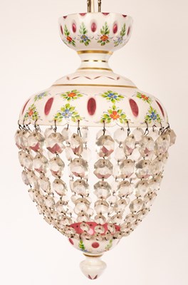 Lot 630 - A Bohemian glass pendant light of red and...