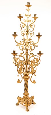 Lot 634 - A gilt metal candle stand, with six-branches...