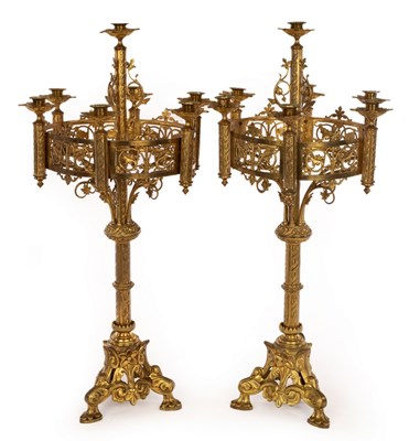 Lot 636 - A pair of Gothic Revival style brass table...