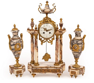 Lot 675 - A French clock garniture of veined marble,...