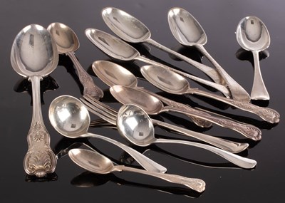 Lot 58 - Three Irish silver feather edge table spoons,...