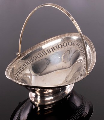 Lot 59 - A George III silver bread basket, Henry...