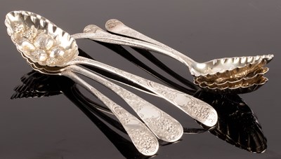 Lot 82 - Six George III silver berry spoons, various...