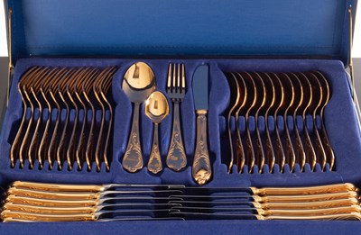 Lot 104 - A German gold plated set of flatware, marked...