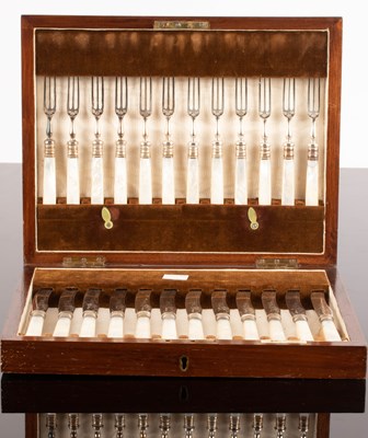 Lot 105 - A set of twelve plated dessert knives and...