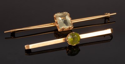 Lot 115 - Two gem set bar brooches, each set in...