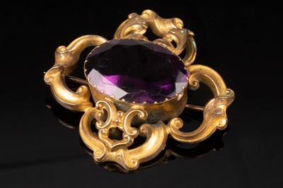 Lot 117 - A Victorian amethyst brooch, the oval amethyst...