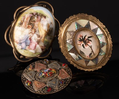 Lot 122 - Three brooches, the largest set in yellow...