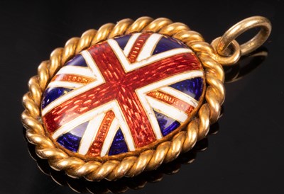 Lot 138 - An oval enamel Union flag pendant within a...