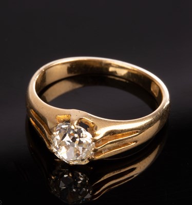 Lot 146 - A diamond solitaire ring, the cushion-shaped...