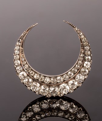 Lot 152 - A Victorian diamond crescent brooch, set with...