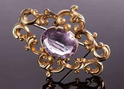 Lot 154 - A Victorian brooch centred by an oval amethyst...