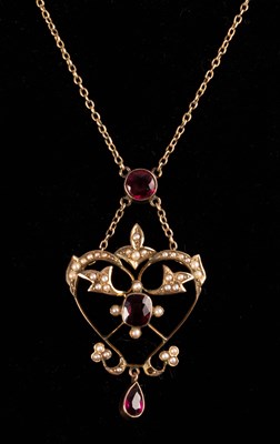 Lot 156 - An Edwardian garnet and pearl heart-shaped...