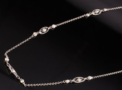 Lot 169 - A fine link pearl set necklace, the long white...