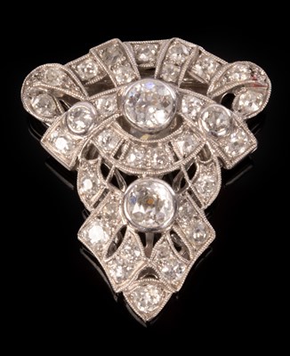 Lot 194 - A diamond clip brooch of openwork form, set in...