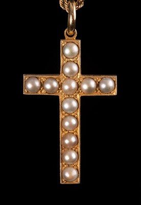 Lot 195 - A pendant cross set with split pearls, Deakin...