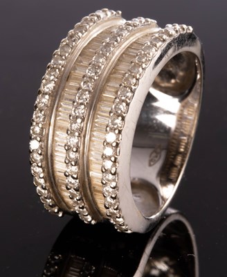 Lot 207 - A modern diamond half hoop ring, set with...