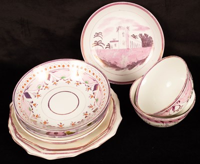 Lot 279 - A group of pink lustre decorated teawares...