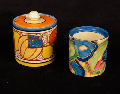 Lot 284 - A Clarice Cliff Fantasque honey pot and cover...