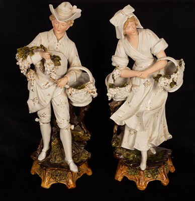 Lot 286 - A pair of French bisque and glazed porcelain...