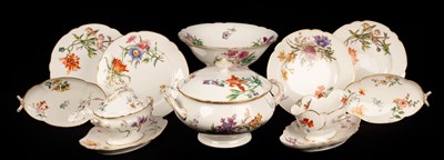 Lot 294 - A French porcelain botanical dinner service...