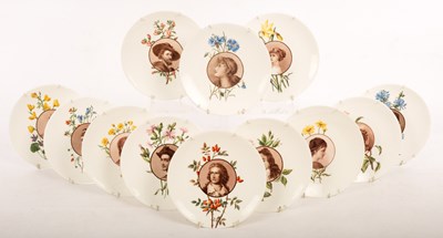 Lot 311 - A set of twelve Coalport plates, each painted...