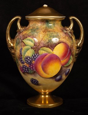 Lot 317 - A Royal Worcester twin-handled vase and cover...