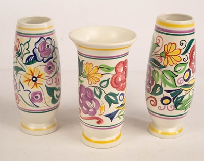 Lot 336 - Poole Pottery, three floral vases, the tallest...