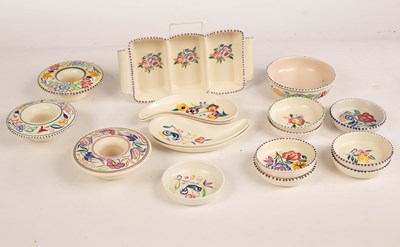 Lot 339 - Poole Pottery, a floral three-section hors...