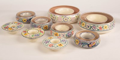 Lot 341 - Poole Pottery, two large floral posy rings,...