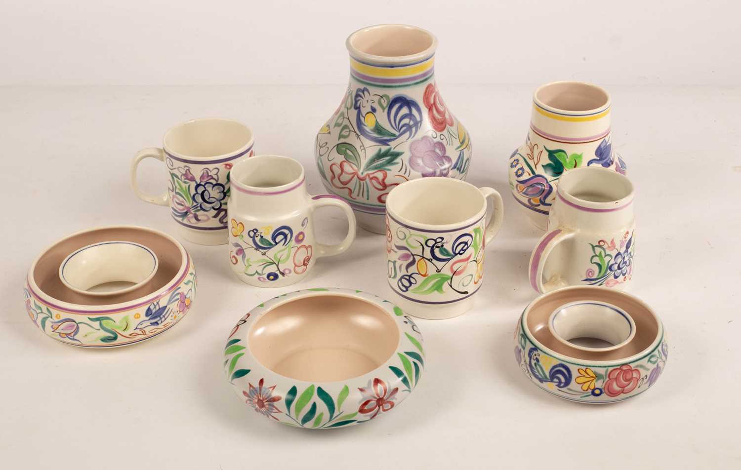 Lot 347 - Poole Pottery, four floral mugs, two floral...
