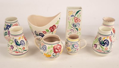 Lot 349 - Poole Pottery, four floral baluster vases, the...