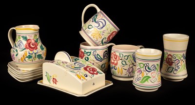 Lot 350 - Poole Pottery, a floral cheese dish and cover,...