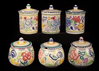 Lot 357 - Poole Pottery, three floral jam pots and...