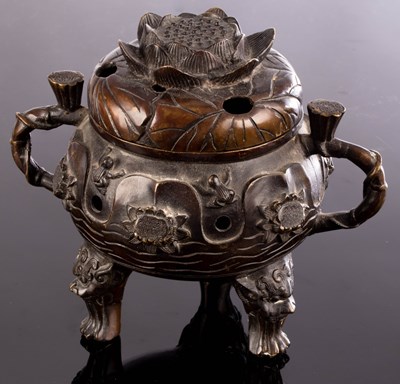 Lot 378 - A Chinese bronze censer, with embossed water...